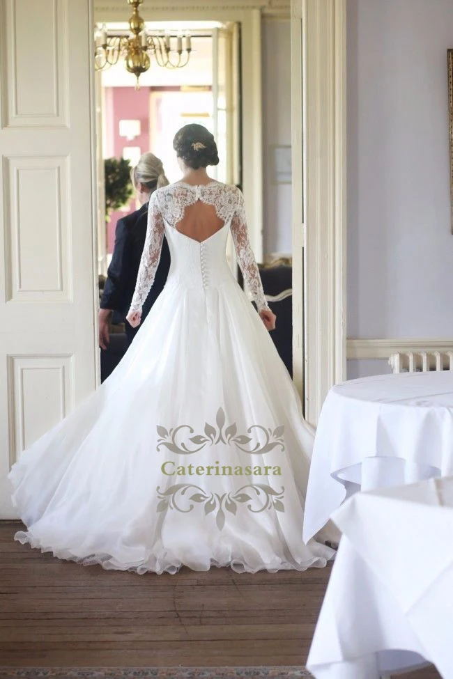 Illusion Long Sleeves Lace Wedding Dress Romantic Appliqued A-Line Tulle Wedding Dresses 2020 Bridal Gowns Vestidos de Noiva
Illusion Long Sleeves Lace Wedding Dress Romantic Appliqued A-Line Tulle Wedding Dresses 2020 Bridal Gowns Vestidos de Noiva