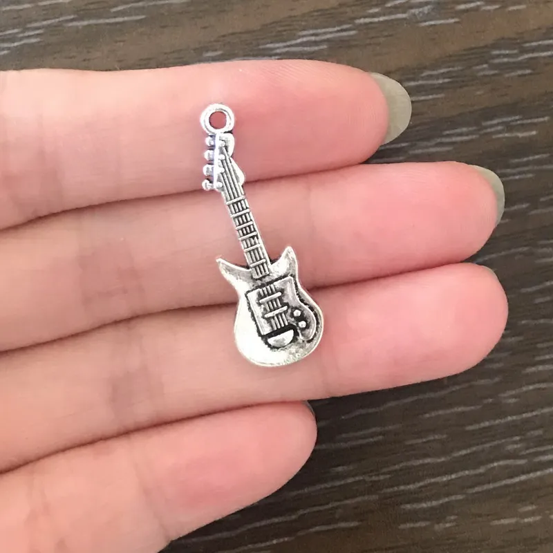 15PCS DIY Jewelry Making Guitar Charms Zinc Alloy Guitar Pendant Charm for Bracelets Necklaces Earrings Book Marks Key Chains
15PCS DIY Jewelry Making Guitar Charms Zinc Alloy Guitar Pendant Charm for Bracelets Necklaces Earrings Book Marks Key Chains
