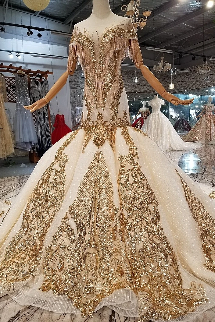 2019 Gold Lace Champagne Tulle Tassel Sequins Sleeveless Chapel Train Bridal Dress Backless Vintage Mermaid Wedding Dresses
2019 Gold Lace Champagne Tulle Tassel Sequins Sleeveless Chapel Train Bridal Dress Backless Vintage Mermaid Wedding Dresses