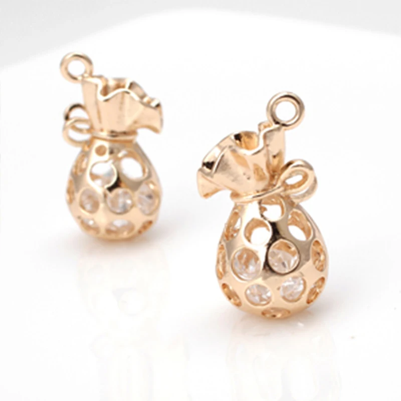 Gold Brass with Zirconia Hollow Purse Charms Pendants Diy Jewelry Findings (4Pcs)
Gold Brass with Zirconia Hollow Purse Charms Pendants Diy Jewelry Findings (4Pcs)