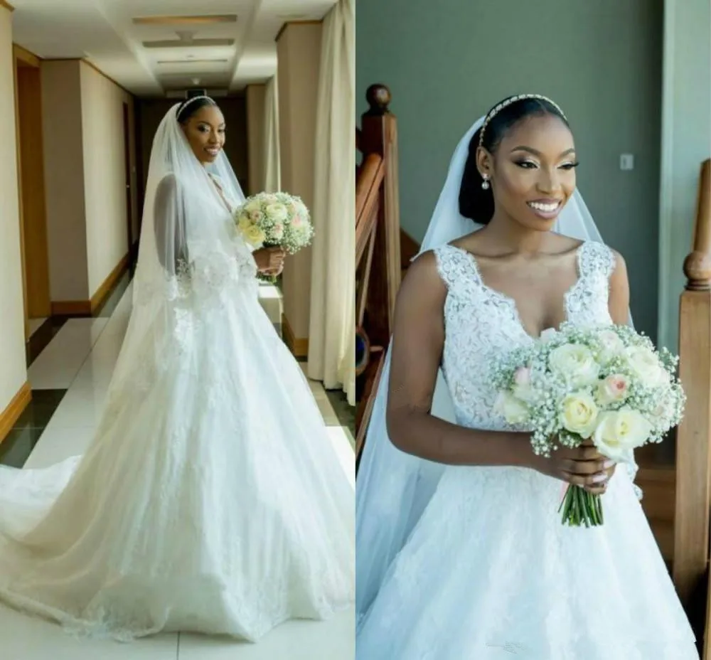 Charming V-Neck African A-Line Wedding Dresses Lace Applique Tulle Plus Size Country robe de mariee Bridal Gowns wedding
Charming V-Neck African A-Line Wedding Dresses Lace Applique Tulle Plus Size Country robe de mariee Bridal Gowns wedding