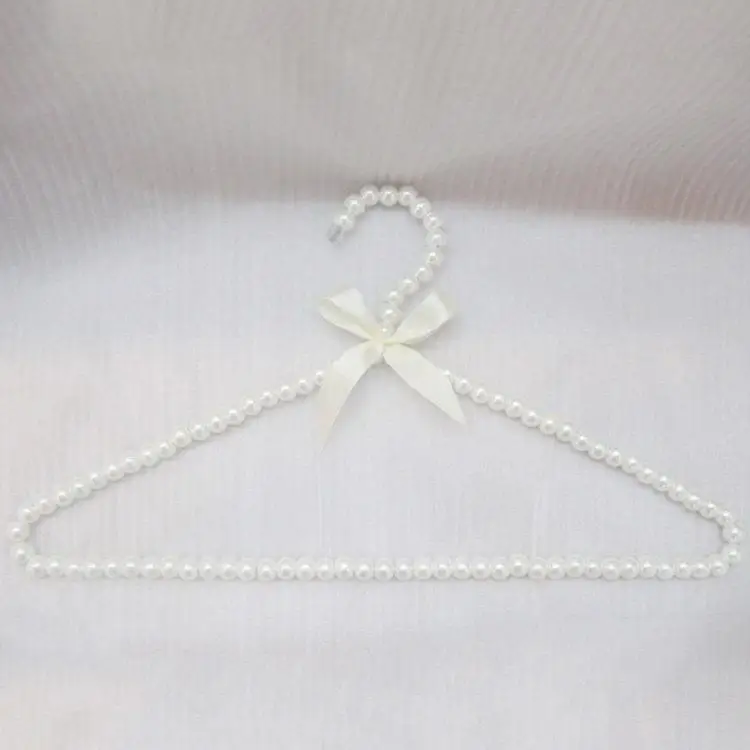 White pearl triangle lovely butterfly knot clothes rack ABS plastic clothes rack display bead hanger
White pearl triangle lovely butterfly knot clothes rack ABS plastic clothes rack display bead hanger
