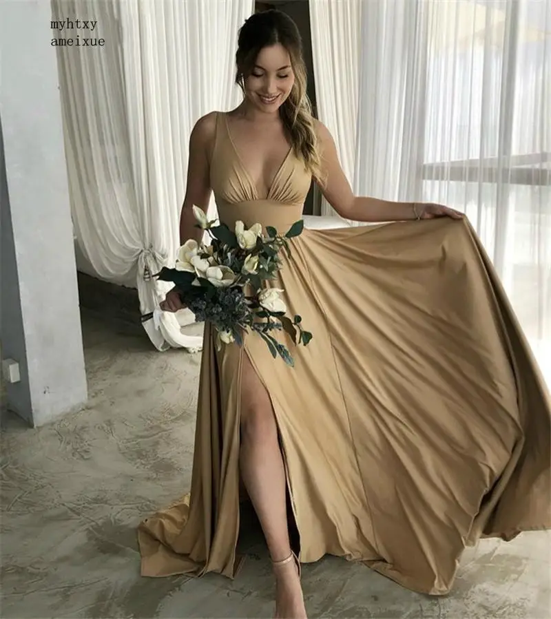 china Gold V-Neck Sleeveless Floor Length Side Slit Silk Satin Evening Dresses Hot Simple Style Backless Evening Dresses
china Gold V-Neck Sleeveless Floor Length Side Slit Silk Satin Evening Dresses Hot Simple Style Backless Evening Dresses