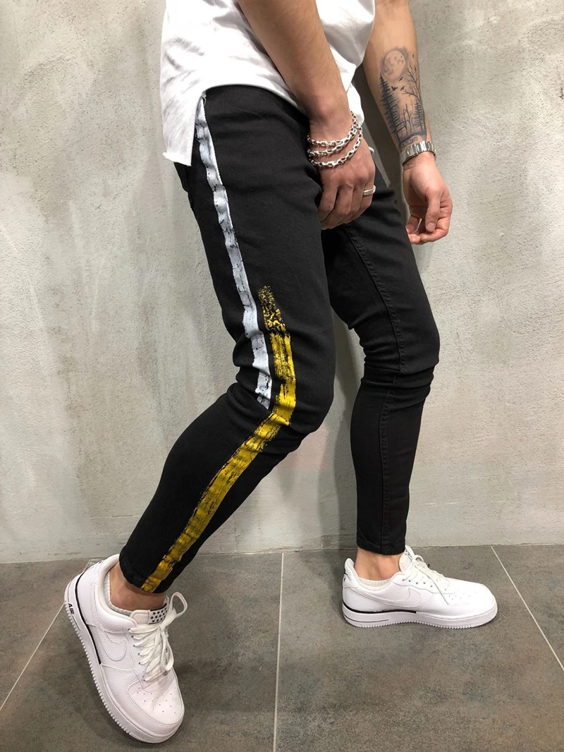 GMANCL Men Gold silver stripe coating printed Skinny jeans Joggers Stretch Slim Fit Black Homme Streetwear Hip Hop Denim Pants
GMANCL Men Gold silver stripe coating printed Skinny jeans Joggers Stretch Slim Fit Black Homme Streetwear Hip Hop Denim Pants
