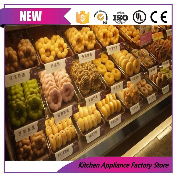 Free shipping automatic lil orbits donut frying machine donut maker doughnut making machine
Free shipping automatic lil orbits donut frying machine donut maker doughnut making machine