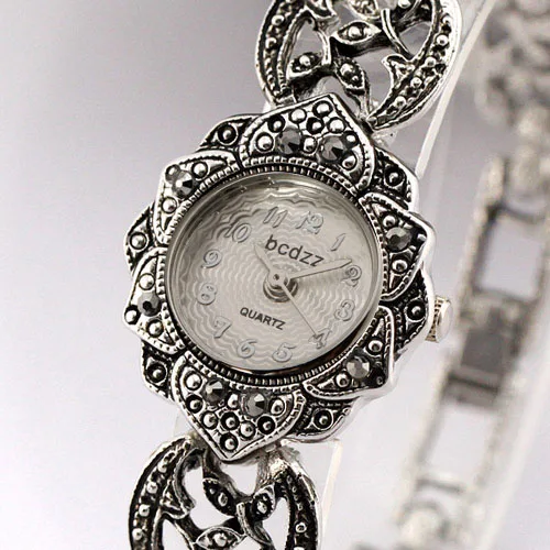 Высококачественные женские часы стразы черный титан серебро сплав кварцевые
