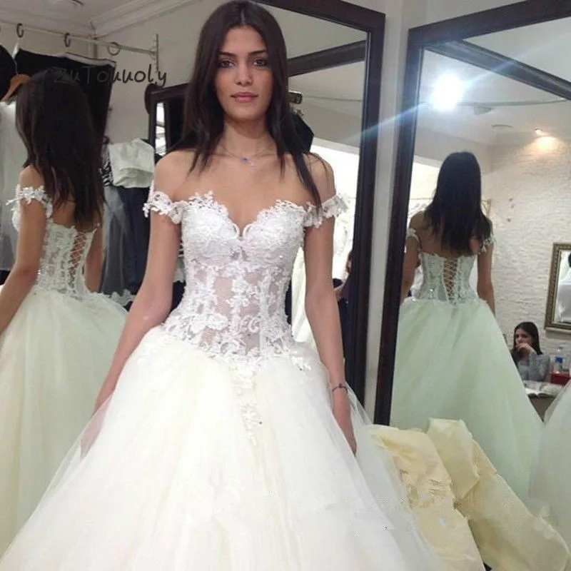 Illusion Top Lace Boho Wedding Dress Off The Shoulder A Line Tulle Lace Up Beach Wedding Dress Plus Size vestido de novia 2019
Illusion Top Lace Boho Wedding Dress Off The Shoulder A Line Tulle Lace Up Beach Wedding Dress Plus Size vestido de novia 2019