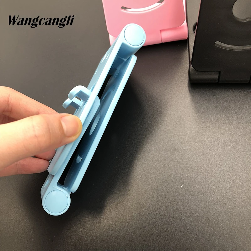 Wangcangli Universal Fold Rotating tablet phone holder for iphone Universal desktop stand for phone Stand mobile support table
Wangcangli Universal Fold Rotating tablet phone holder for iphone Universal desktop stand for phone Stand mobile support table