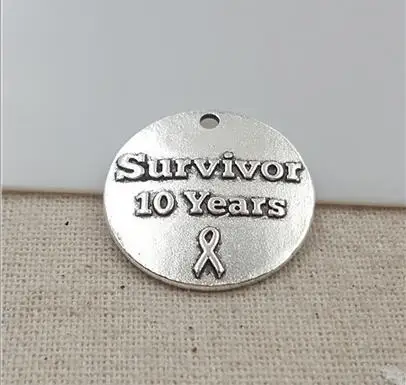 High Quality 20 Pieces/Lot Diameter 25mm Antique Silver Plated Embossed Survivor 10 year Round Disc Charms Pendants
High Quality 20 Pieces/Lot Diameter 25mm Antique Silver Plated Embossed Survivor 10 year Round Disc Charms Pendants
