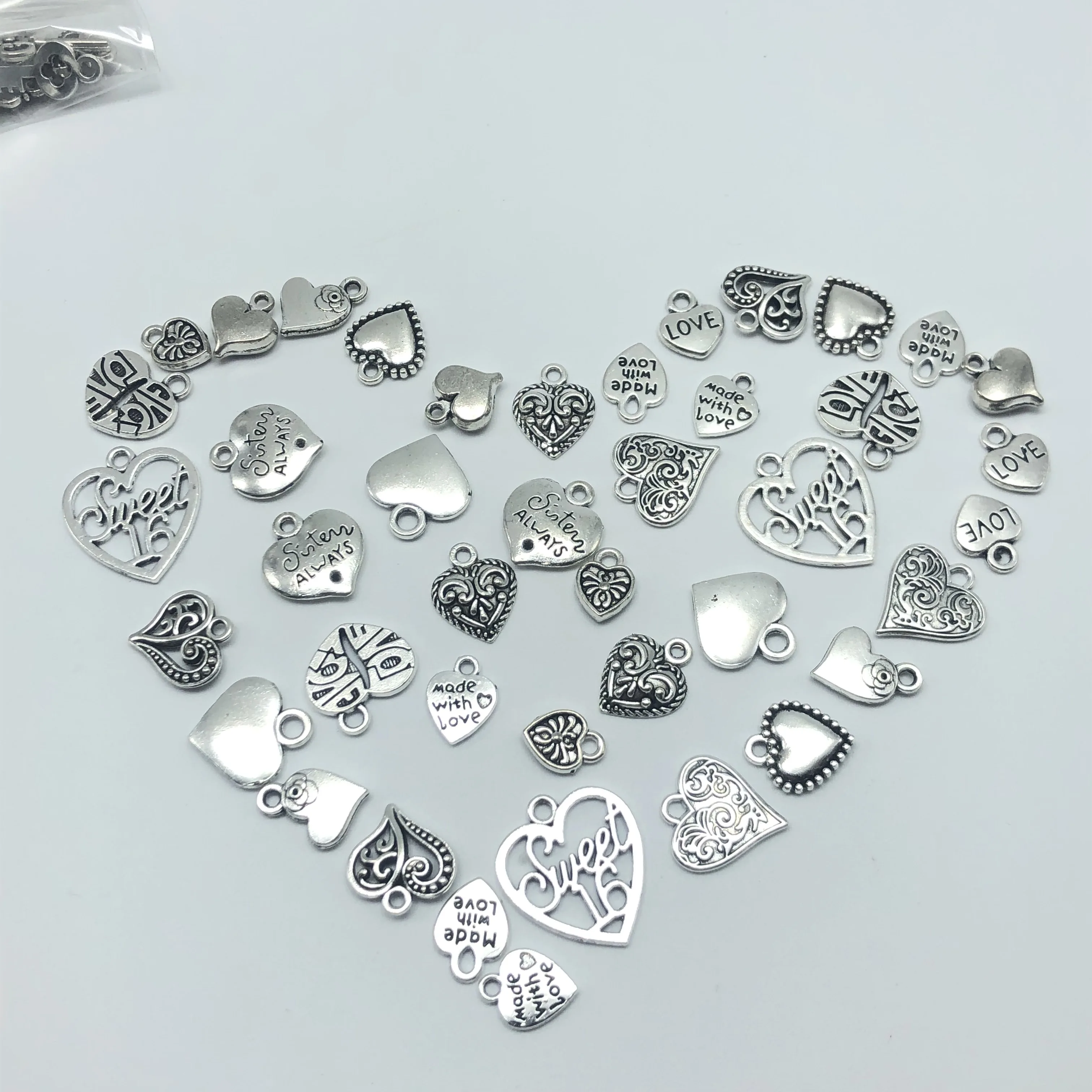 ДжунКанг 30 штук Разнообразная серия сплавных тибетских серебряных сердец для ювелирных изделий-амулетов классических модных находок DIY.