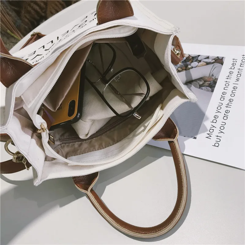 Vintage letter canvas leather patchwork handbag women bag purse Designer shoulder bag tote bag Sac a main bolsas femininas 19001
Vintage letter canvas leather patchwork handbag women bag purse Designer shoulder bag tote bag Sac a main bolsas femininas 19001