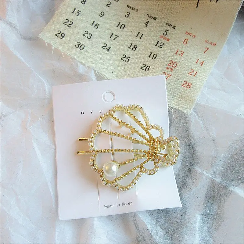 2021 Korea Starfish Shell Imitation Pearl Hair Clips Crystal Rhinestones Hairpins For Women Sandy Beach Hair Accessories Jewelry
2021 Korea Starfish Shell Imitation Pearl Hair Clips Crystal Rhinestones Hairpins For Women Sandy Beach Hair Accessories Jewelry