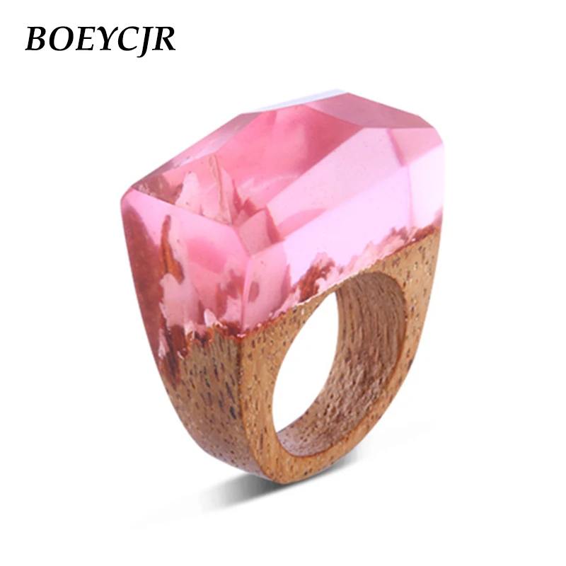 Кольца BOEYCJR из розового дерева и смолы, модные ювелирные изделия, новый мир в стекле, деревянные кольца для женщин
Кольца BOEYCJR из розового дерева и смолы, модные ювелирные изделия, новый мир в стекле, деревянные кольца для женщин