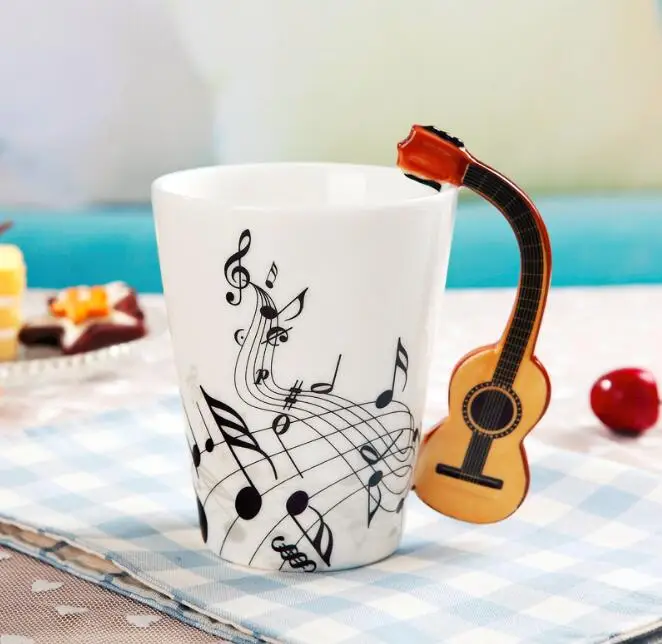 brand new LIKE Novelty Guitar Ceramic Mug Creative Music Violin Style Coffee Tea Milk Stave Cups with Handle Coffee Mug Novelty
brand new LIKE Novelty Guitar Ceramic Mug Creative Music Violin Style Coffee Tea Milk Stave Cups with Handle Coffee Mug Novelty