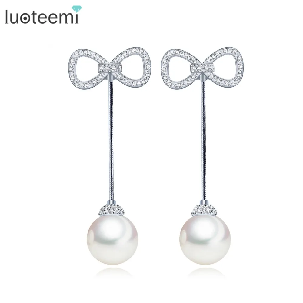 LUOTEEMI Luxury Cubic Zirconia Noble Bowknot With Round Created Pearl Drop Long Dangle Earring Brincos For Women Wedding Jewelry
LUOTEEMI Luxury Cubic Zirconia Noble Bowknot With Round Created Pearl Drop Long Dangle Earring Brincos For Women Wedding Jewelry