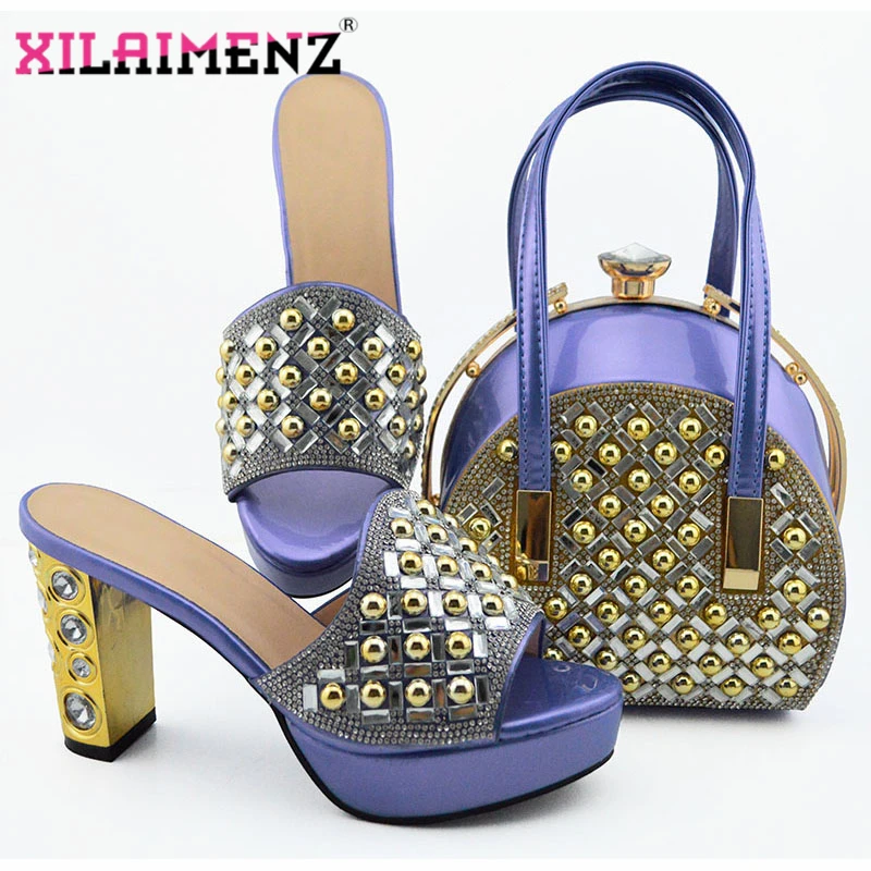 New Arrival Violet Women Slippers and Bag Set Decorated with Rhinestone Shoes and Bag Set In Italy Women Dress Wedding Shoes
New Arrival Violet Women Slippers and Bag Set Decorated with Rhinestone Shoes and Bag Set In Italy Women Dress Wedding Shoes