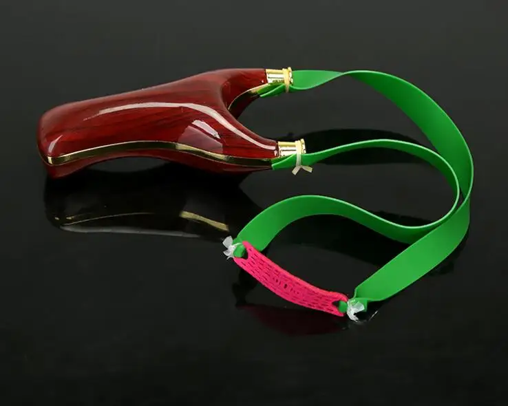 Outdoor shooting game Hunting sports Flat leather band slingshot
Outdoor shooting game Hunting sports Flat leather band slingshot