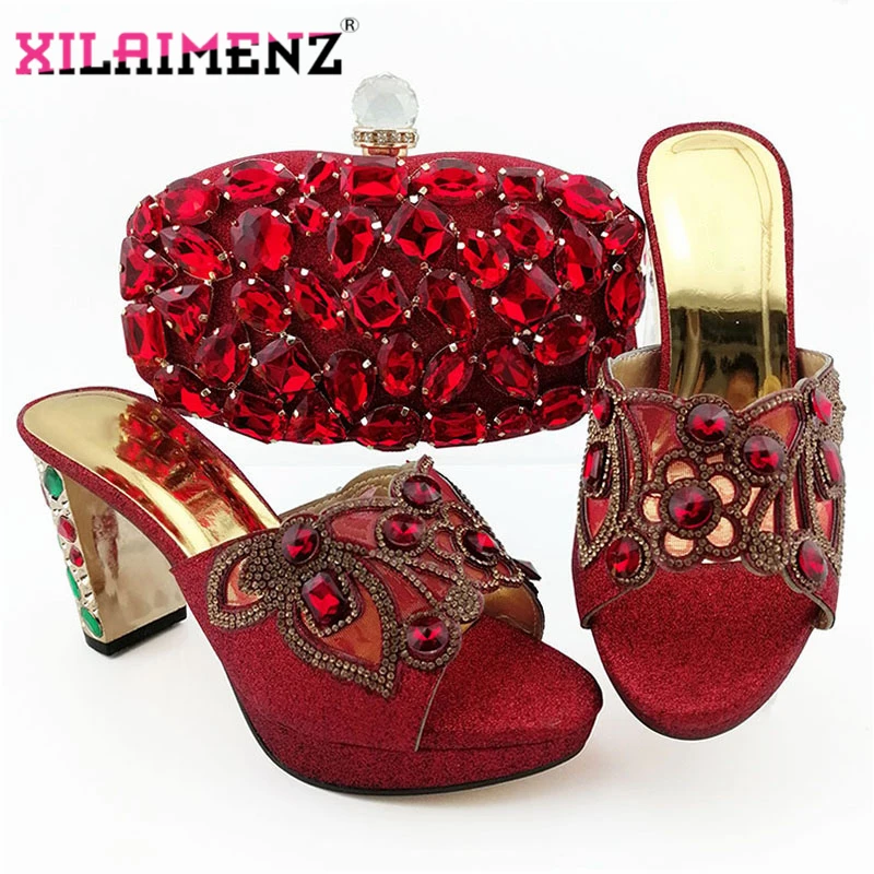 Fashion Red Color African Women Matching Italian Slippers and Bag Set Decorated with Rhinestone Ladies Shoe and Bag for Wedding
Fashion Red Color African Women Matching Italian Slippers and Bag Set Decorated with Rhinestone Ladies Shoe and Bag for Wedding