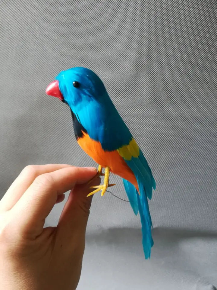 real life Bird beautiful blue feathers parrot bird model about 20cm home garden decoration prop decoration toy gift h1054
real life Bird beautiful blue feathers parrot bird model about 20cm home garden decoration prop decoration toy gift h1054