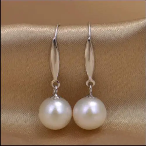 AAA+10mm perfect round Australia south sea Pearl Earrings >>>girls for women Free shipping
AAA+10mm perfect round Australia south sea Pearl Earrings >>>girls for women Free shipping