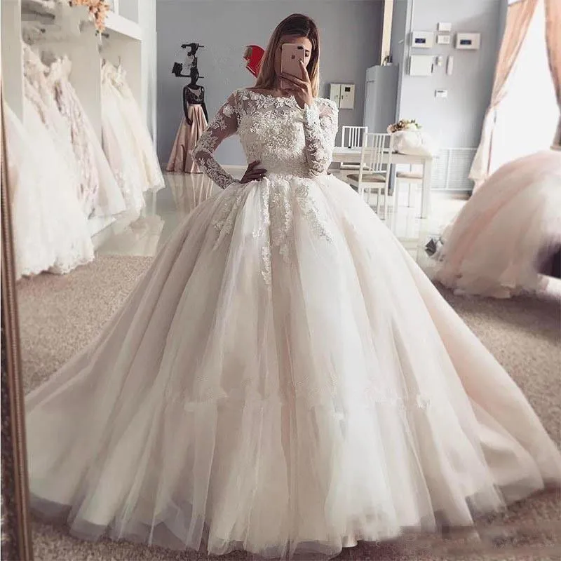 Amaziing Ball Gown Wedding Dress Long Sleeve Tulle Applqiued Bridal Gowns Button Back robe mariage femme
Amaziing Ball Gown Wedding Dress Long Sleeve Tulle Applqiued Bridal Gowns Button Back robe mariage femme
