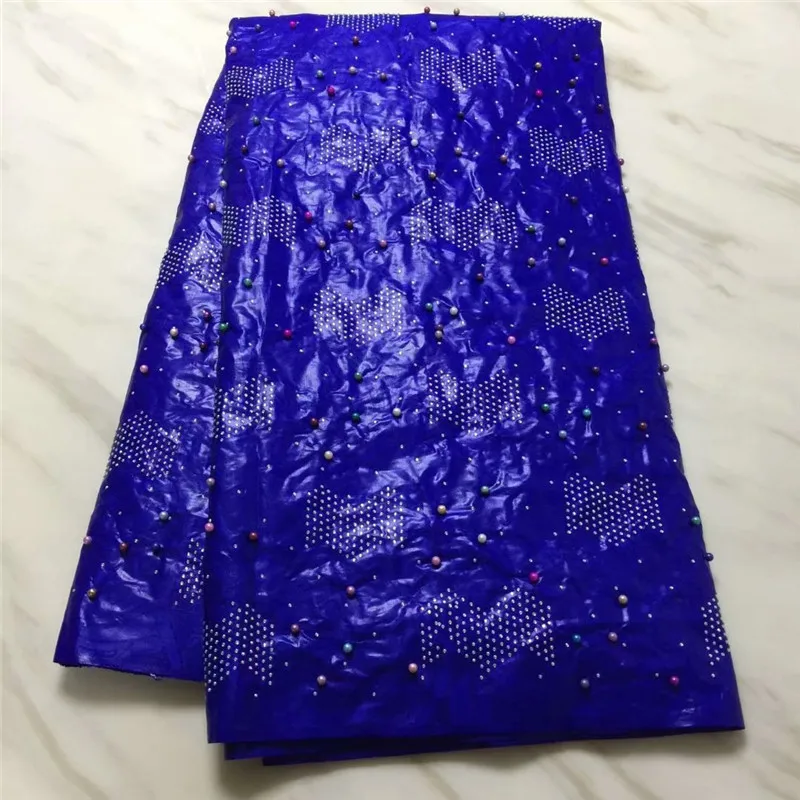 Blue brocade fabric bazin riche with stones and beads French lace bazin riche embroidery for women dresses pl65-1311
Blue brocade fabric bazin riche with stones and beads French lace bazin riche embroidery for women dresses pl65-1311