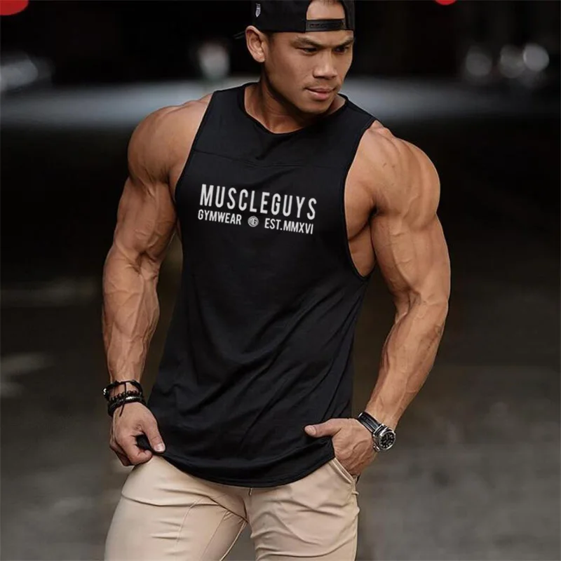 Muscleguys Фитнес хлопок майка для мужчин жилет бодибилдинг одежда спортивная одежда топики без рукавов рубашки бренд тренажерные залы Джерси ...
Muscleguys Фитнес хлопок майка для мужчин жилет бодибилдинг одежда спортивная одежда топики без рукавов рубашки бренд тренажерные залы Джерси ...