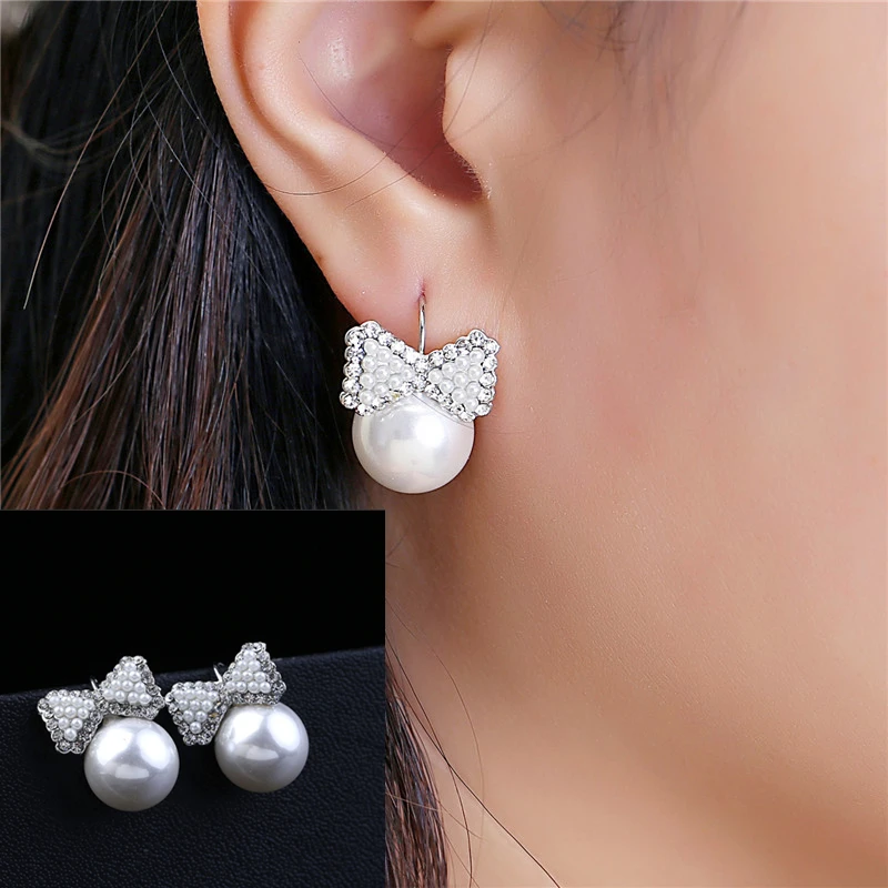 New Fashion Lovely Wedding Ear Silver Plated Round Imitation Beads Bow Pearl Stud Earrings for Women Girls Rhinestone Jewelry
New Fashion Lovely Wedding Ear Silver Plated Round Imitation Beads Bow Pearl Stud Earrings for Women Girls Rhinestone Jewelry