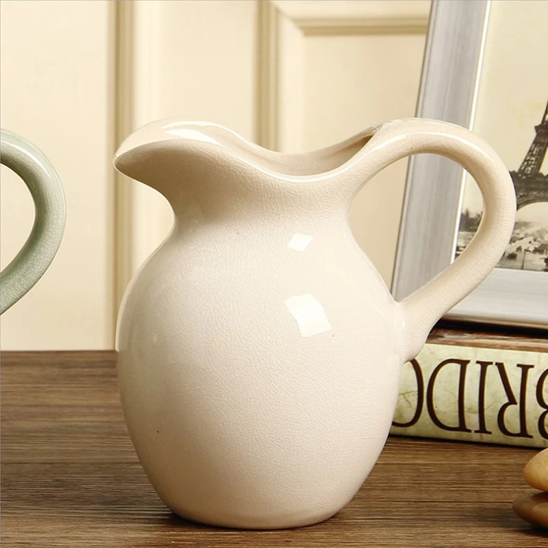 Nordic With handle ceramic vase decoration Single ear vase flower Water container flower vase for home wedding decoration
Nordic With handle ceramic vase decoration Single ear vase flower Water container flower vase for home wedding decoration