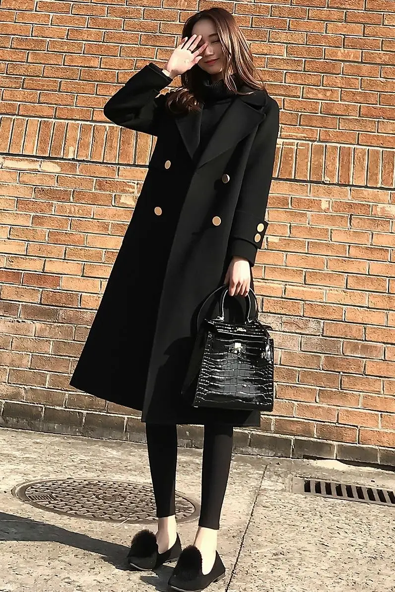 2020 autumn and winter new Korean version of the loose thin female long black woolen coat
2020 autumn and winter new Korean version of the loose thin female long black woolen coat
