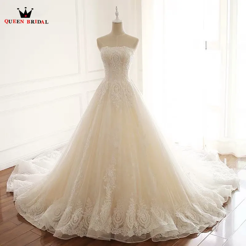 Ball Gown Strapless Big Trian Tulle Lace Beading Elegant Formal Wedding Dresses Bridal Gowns Vestido De Noiva Custom Made RP20
Ball Gown Strapless Big Trian Tulle Lace Beading Elegant Formal Wedding Dresses Bridal Gowns Vestido De Noiva Custom Made RP20