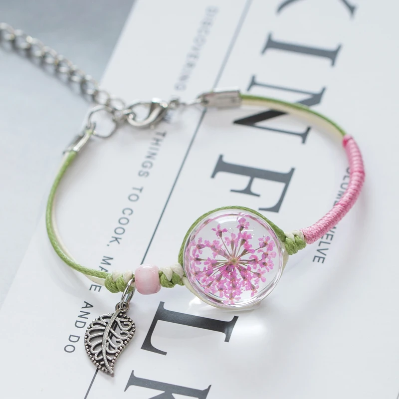 Handmade Dried flower bracelet female Korean version of the simple character glass ball sakura girl friend exquisite jewelry
Handmade Dried flower bracelet female Korean version of the simple character glass ball sakura girl friend exquisite jewelry