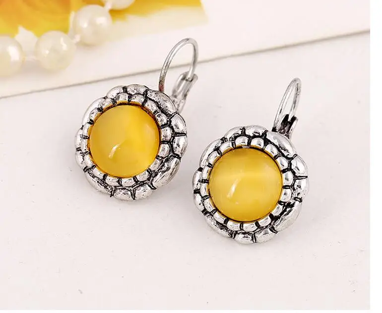 Винтажные старинные серебряные металлические подсолнухи круглые кошачий глаз камень Женские Висячие серьги одна пара xye232
Винтажные старинные серебряные металлические подсолнухи круглые кошачий глаз камень Женские Висячие серьги одна пара xye232