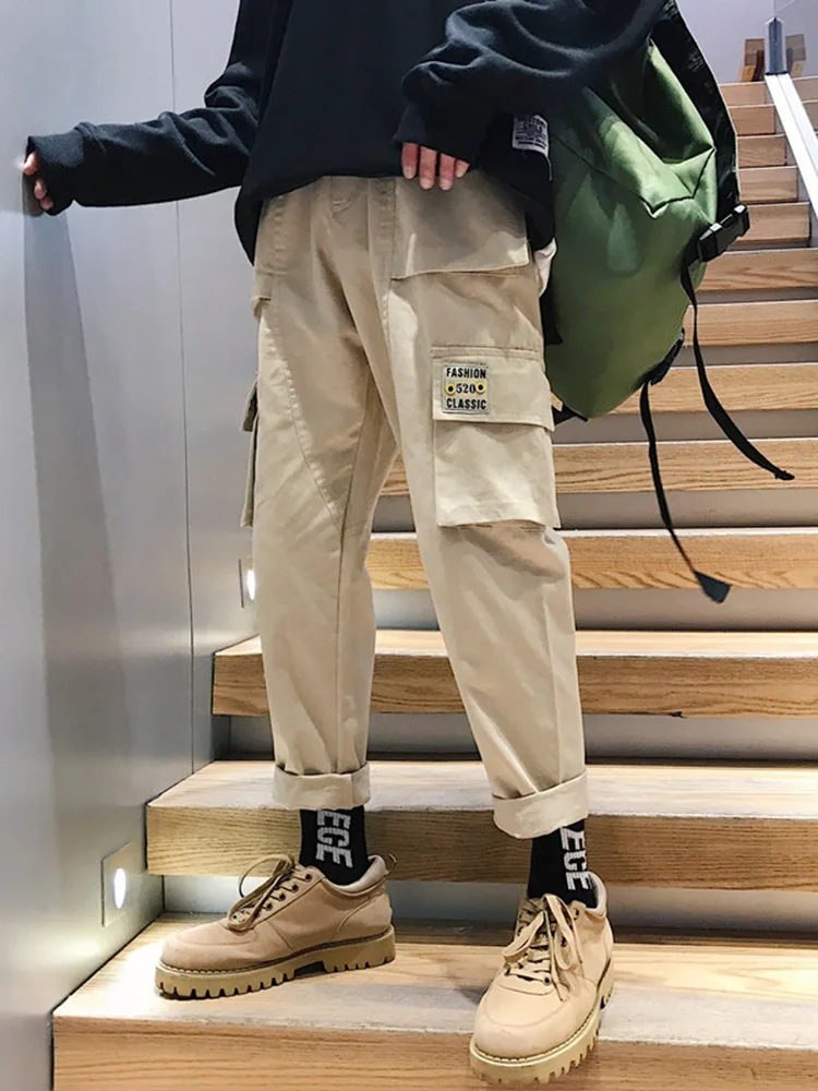 Literary Pants Men Hong Kong version loose nine casual trend sports overalls mens joggers sweatpants tactical hip hop Men pants
Literary Pants Men Hong Kong version loose nine casual trend sports overalls mens joggers sweatpants tactical hip hop Men pants