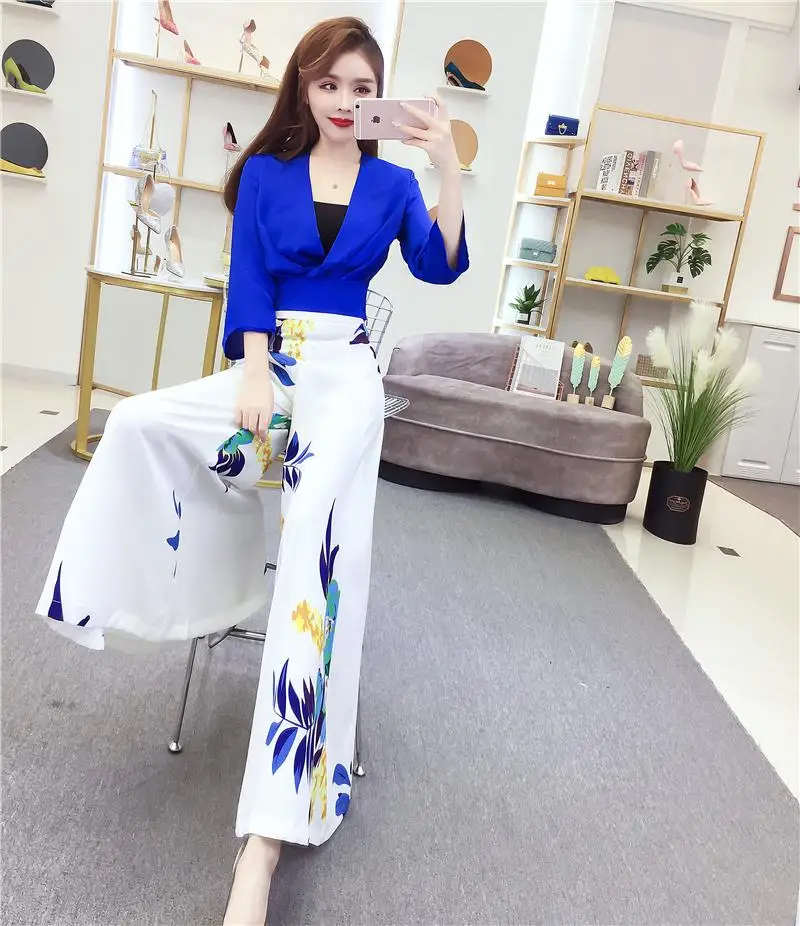 New suit women two-piece clothing set v-neck printed tops of tall waist wide-legged pants print trousers fashion lady vestidos
New suit women two-piece clothing set v-neck printed tops of tall waist wide-legged pants print trousers fashion lady vestidos