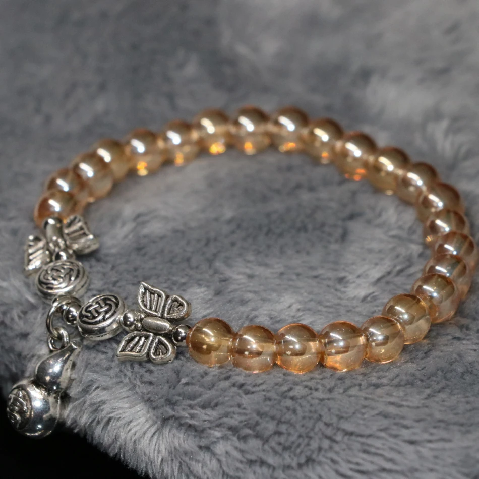 Elastic bracelet luxury electroplate champagne crystal 6mm round beads gift silver-color gourd pendant jewelry 7.5inch B2137
Elastic bracelet luxury electroplate champagne crystal 6mm round beads gift silver-color gourd pendant jewelry 7.5inch B2137