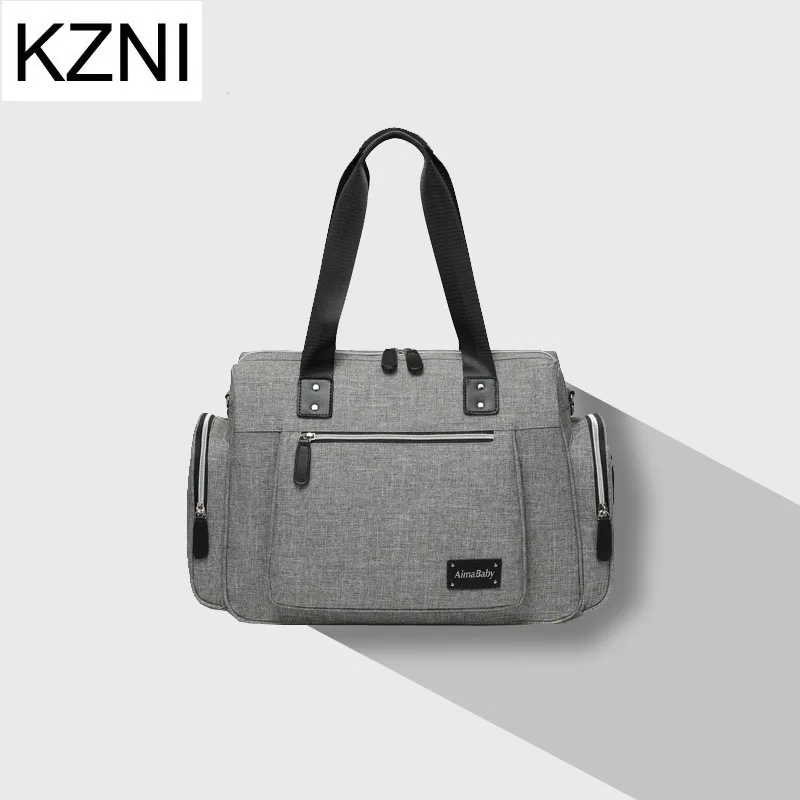 Diaper Bag,KZNI Large Diaper Tote Stylish for Mom and Dad Convertible Travel Baby Bag for Boys and Girls
Diaper Bag,KZNI Large Diaper Tote Stylish for Mom and Dad Convertible Travel Baby Bag for Boys and Girls