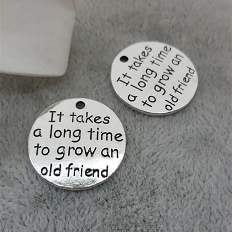 10pcs/Lot 25mm Antique Silver colour letter printed It takes a long time to grow an old friend charm round disc message charms
10pcs/Lot 25mm Antique Silver colour letter printed It takes a long time to grow an old friend charm round disc message charms