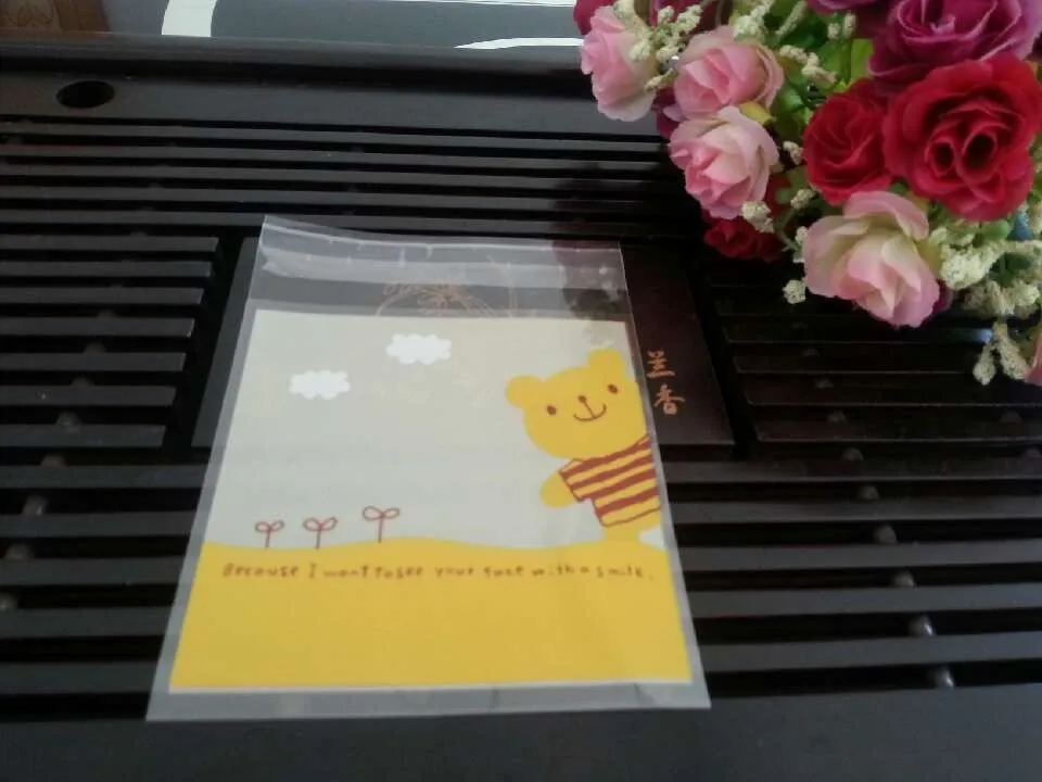 E1 Attractive Bear design 10*13 Cookie packaging white lace bow self-adhesive plastic bags for biscuits snack baking package
E1 Attractive Bear design 10*13 Cookie packaging white lace bow self-adhesive plastic bags for biscuits snack baking package