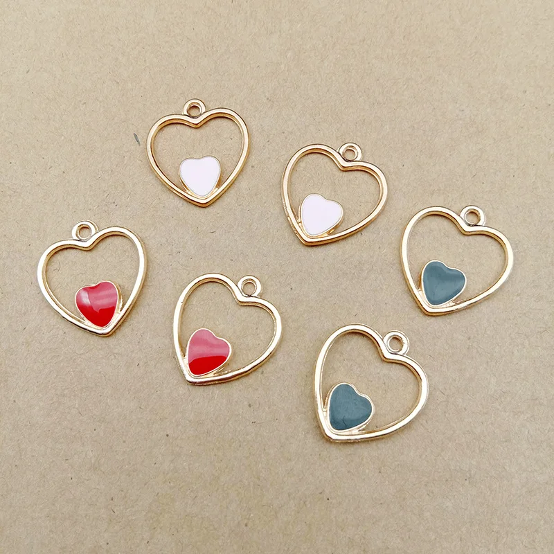 Wholesale 100pcs/Lot 20*18MM Lovely Heart Pendant Charms Hollow Out Style Enamel Alloy DIY Jewelry Findings Earring Necklace
Wholesale 100pcs/Lot 20*18MM Lovely Heart Pendant Charms Hollow Out Style Enamel Alloy DIY Jewelry Findings Earring Necklace