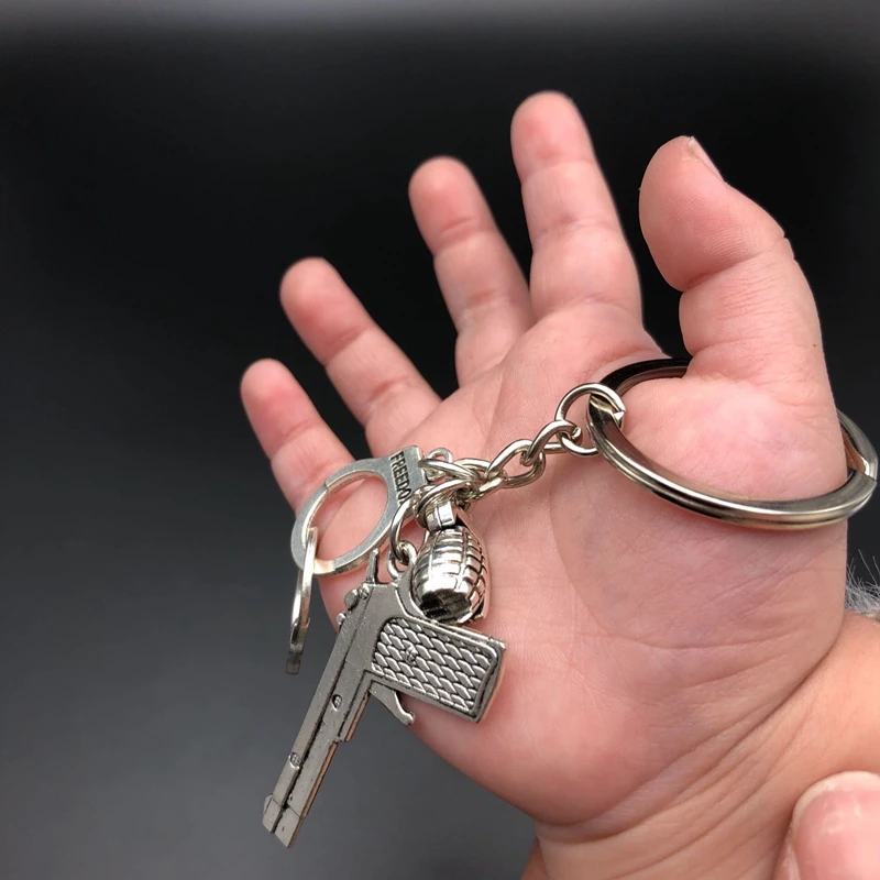 2019 Hand-matched Arms Weapon Police with Keychain Pistol Handcuffs grenad Combination Model Silver Metal Key Ring Man's Gift
2019 Hand-matched Arms Weapon Police with Keychain Pistol Handcuffs grenad Combination Model Silver Metal Key Ring Man's Gift