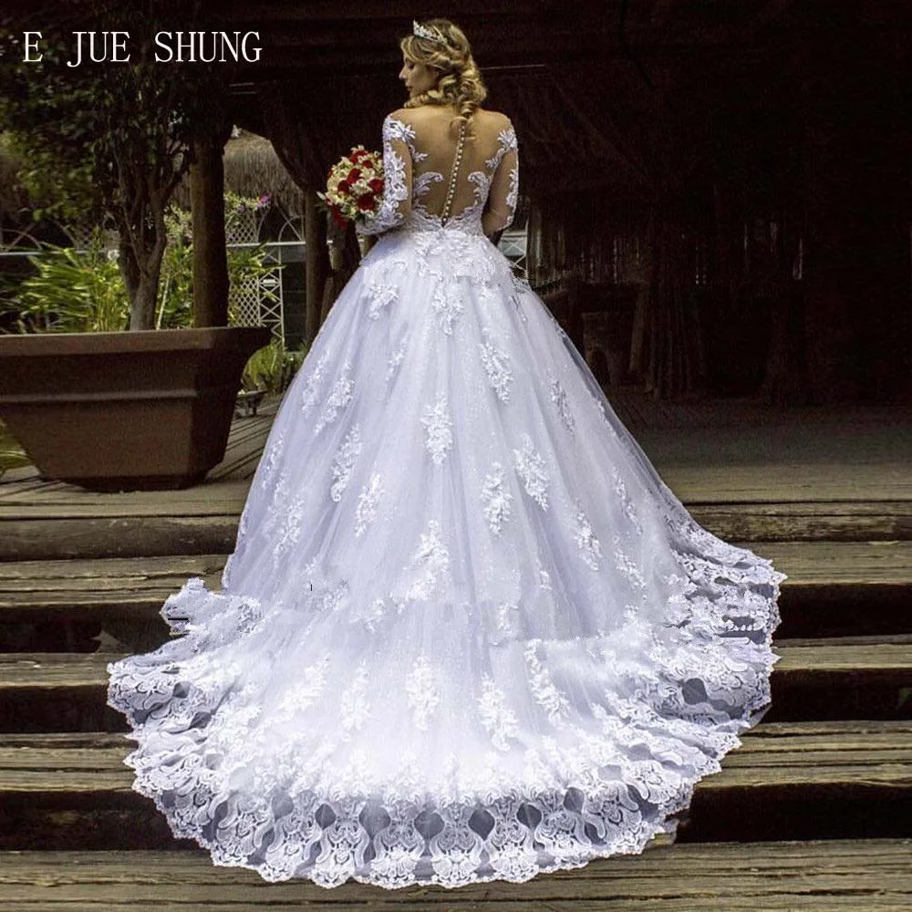 Glitter Lace Appliques Ball Gown Wedding Dresses Buttons Sheer Back Long Sleeves Bridal Gowns Court Train
Glitter Lace Appliques Ball Gown Wedding Dresses Buttons Sheer Back Long Sleeves Bridal Gowns Court Train