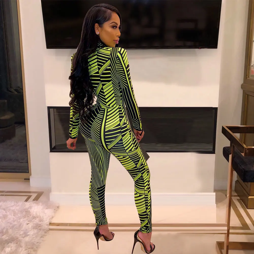 Printing Front zipper Long sleeve jumpsuits Autumn and winter neon Green, orange stripe Collect waist trousers
Printing Front zipper Long sleeve jumpsuits Autumn and winter neon Green, orange stripe Collect waist trousers