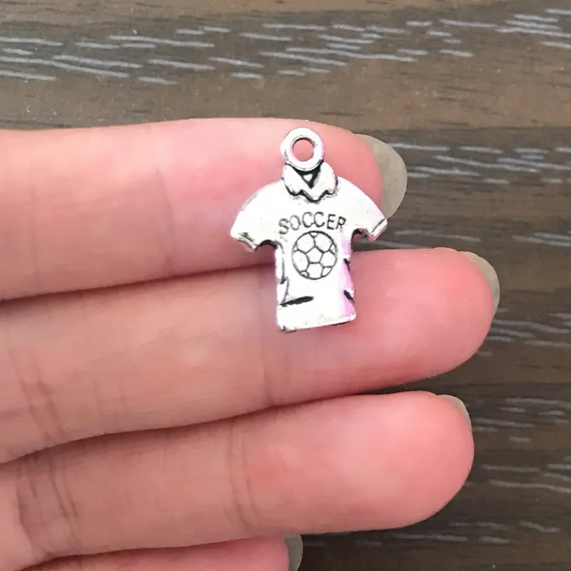 12PCS DIY Sport Charm Metal Soccer Shirt Charms Zinc Alloy Sports Pendant Charm for Bracelet Necklace Earring Jewelry Making
12PCS DIY Sport Charm Metal Soccer Shirt Charms Zinc Alloy Sports Pendant Charm for Bracelet Necklace Earring Jewelry Making