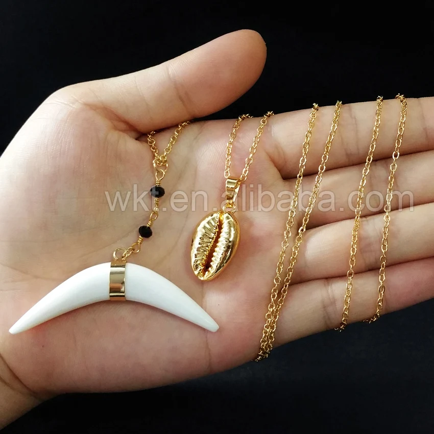 WT-N684 Double pendant Choker necklace Wholesale 5pcs necklace natural bone horn pendant tiny cowrie pendant gold necklace gift
WT-N684 Double pendant Choker necklace Wholesale 5pcs necklace natural bone horn pendant tiny cowrie pendant gold necklace gift