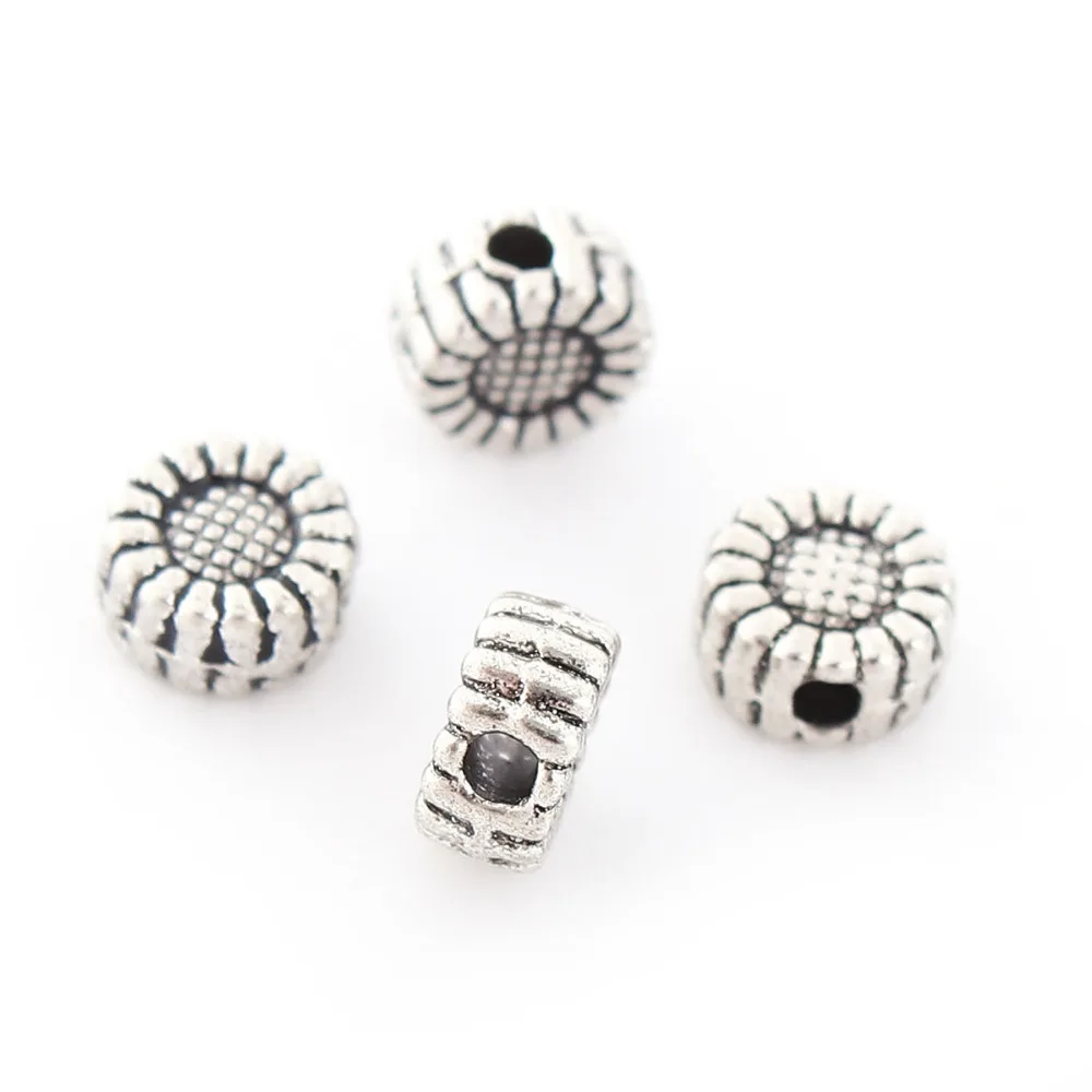 DoreenBeads Zinc Based Alloy Spacer Beads Sunflower Round Antique Silver Color About 6mm( 2/8") Dia, Hole: Approx 1.4mm, 100 PCs
DoreenBeads Zinc Based Alloy Spacer Beads Sunflower Round Antique Silver Color About 6mm( 2/8") Dia, Hole: Approx 1.4mm, 100 PCs