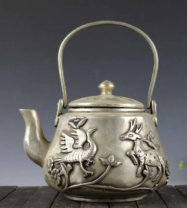 Antique Old QingDynasty silver teapot,Rich pot,Exquisite carving,hand crafts,best collection&adornment,free shipping
Antique Old QingDynasty silver teapot,Rich pot,Exquisite carving,hand crafts,best collection&adornment,free shipping