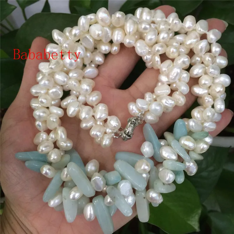 New freshwater pearl white 7-8 mm irregular shaped 3 row and natural stone necklace 20inches
New freshwater pearl white 7-8 mm irregular shaped 3 row and natural stone necklace 20inches