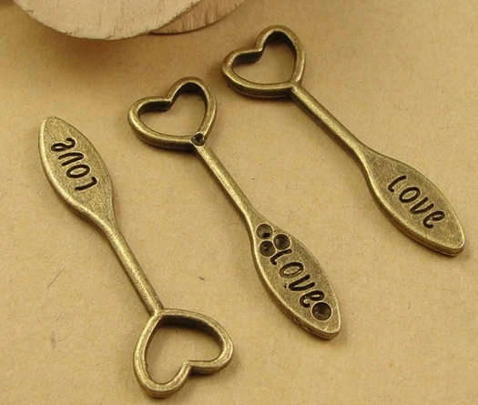 A3469 Free Shipping! 100pcs/bag size 38*12mm bronze color The " bottle opener" pendant Fashion Jewelry accessories
A3469 Free Shipping! 100pcs/bag size 38*12mm bronze color The " bottle opener" pendant Fashion Jewelry accessories