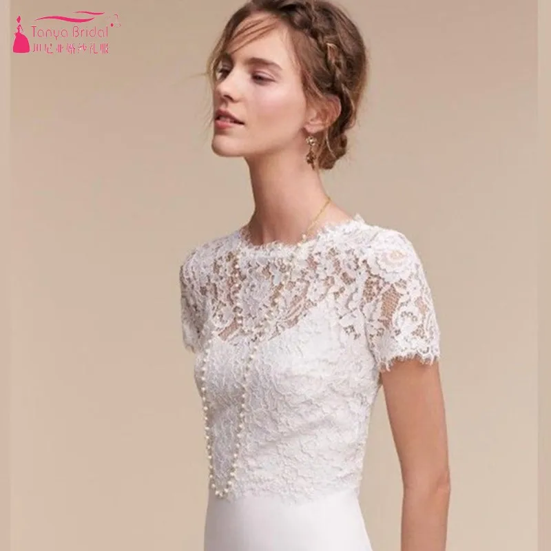 Ivory Lace Wedding Jacket Wrap O Neck With Buttons Back Bride Bolero Cape Free Shipping In stock Real Photos DQG961
Ivory Lace Wedding Jacket Wrap O Neck With Buttons Back Bride Bolero Cape Free Shipping In stock Real Photos DQG961